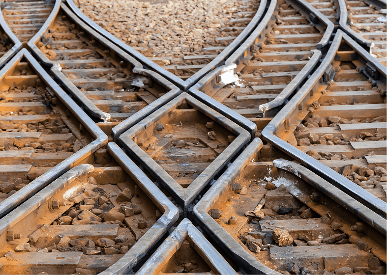 Intersecting railway tracks with gravel