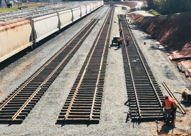 Railway tracks under construction at a work site.
